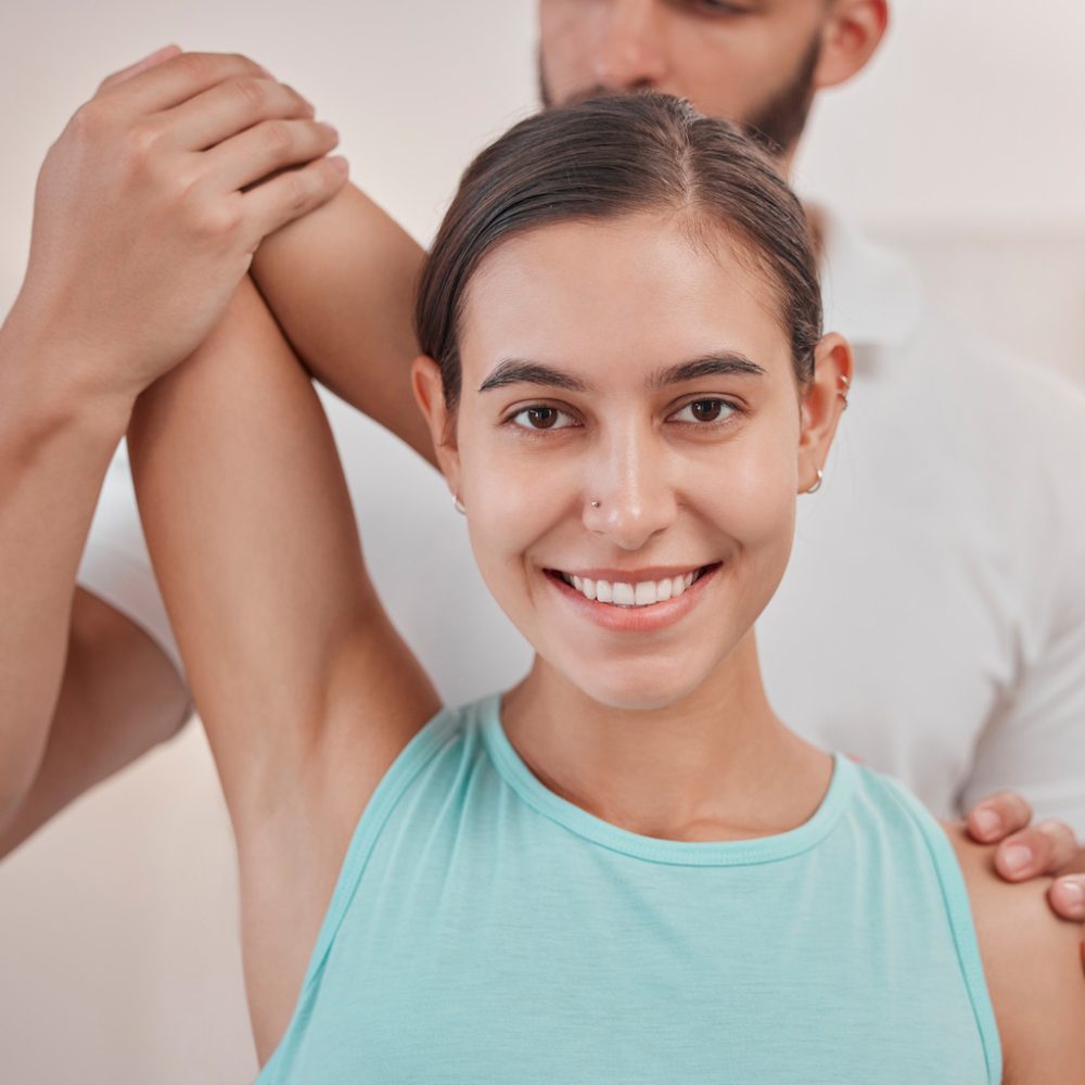 Physical therapy, woman and physiotherapy of a chiropractor helping with an arm stretch